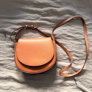 a new day Tan Saddle Crossbody Bag